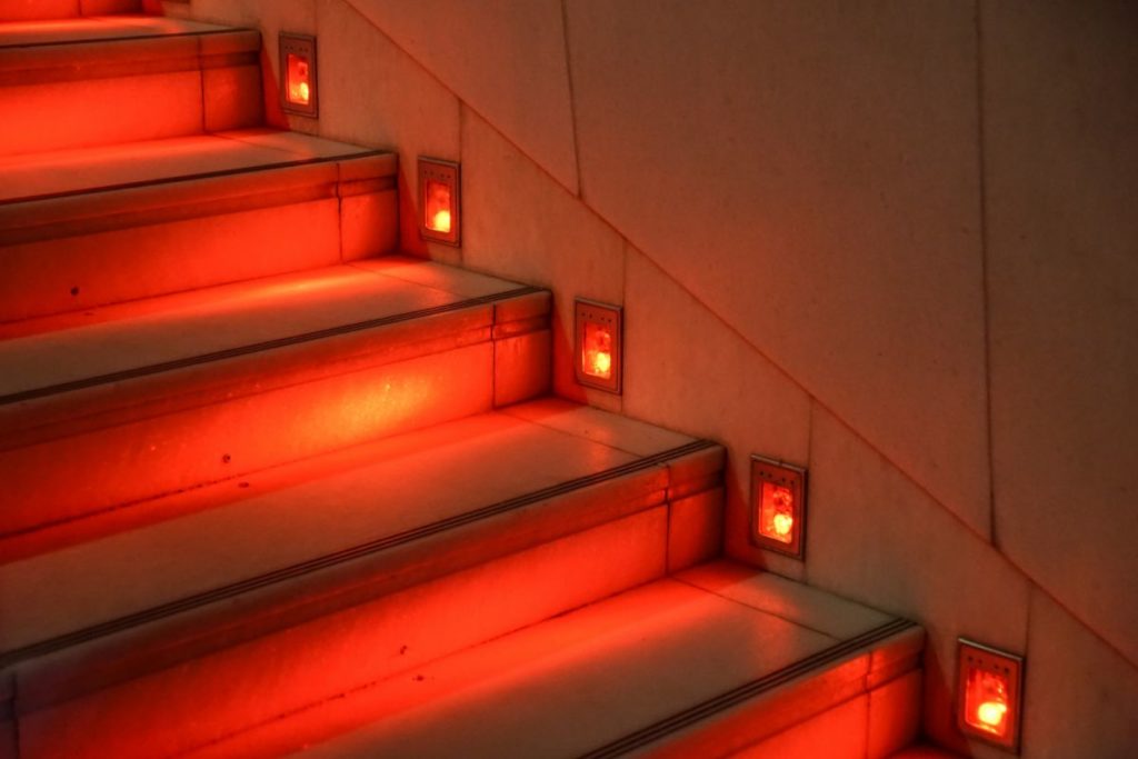 Red LED lighting on stairs. Effective LED lighting.